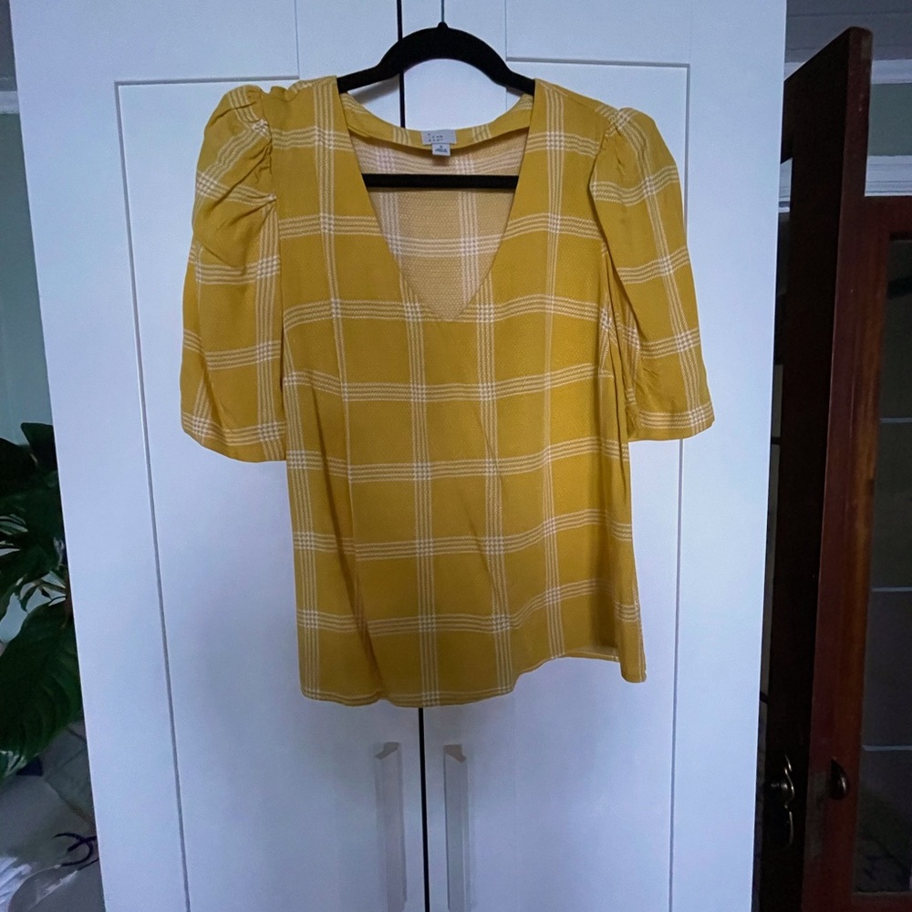 A new day yellow top